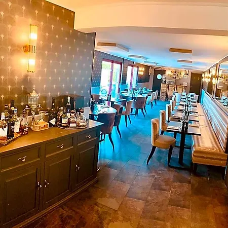 Le Coq Hardi Hotel